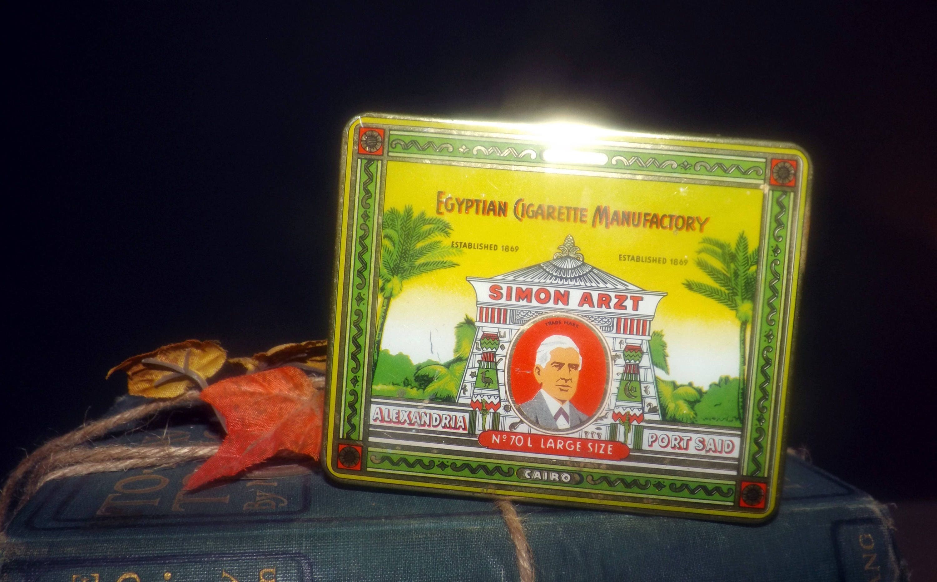 simon arzt cigarettes Mid-century (1950s) Simon Arzt No 70 Large-size Cigarettes Tin. Egyptian  Cigarette Manufactory. Original Tax Labels Intact
