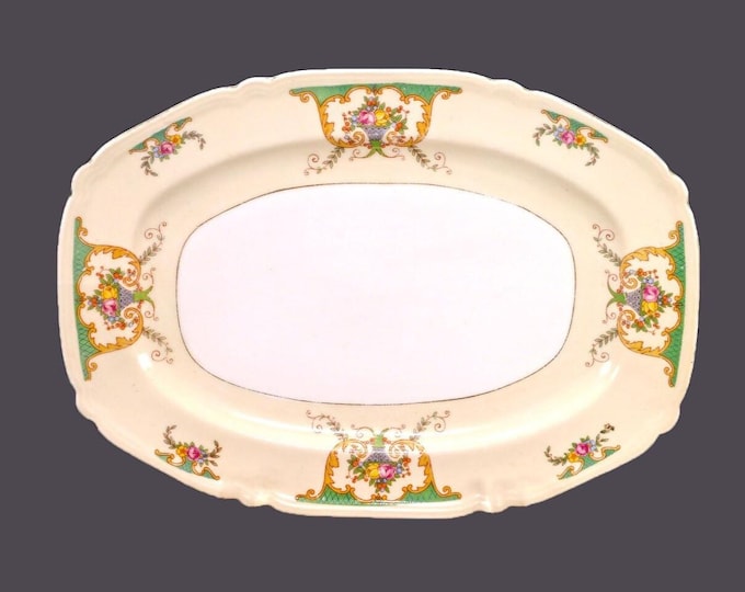CLP Czechoslovakia oval sandwich tray. Florals in urns, green bars, yellow band, gold edge.