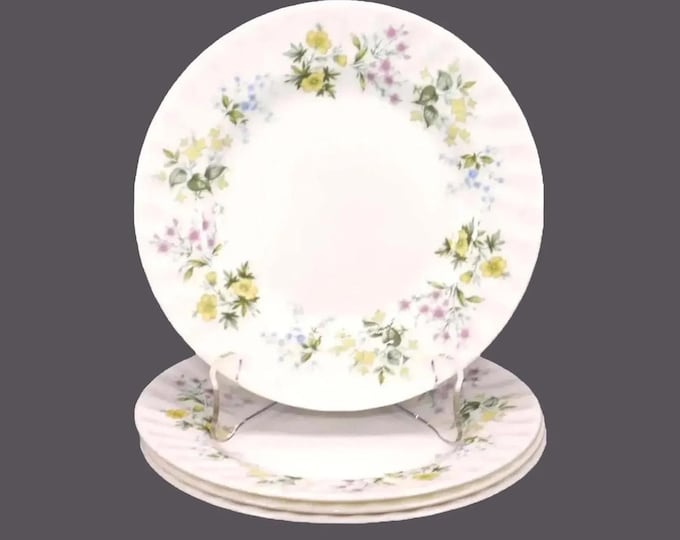 Four Minton Spring Valley bread plates. Bone china made in England.