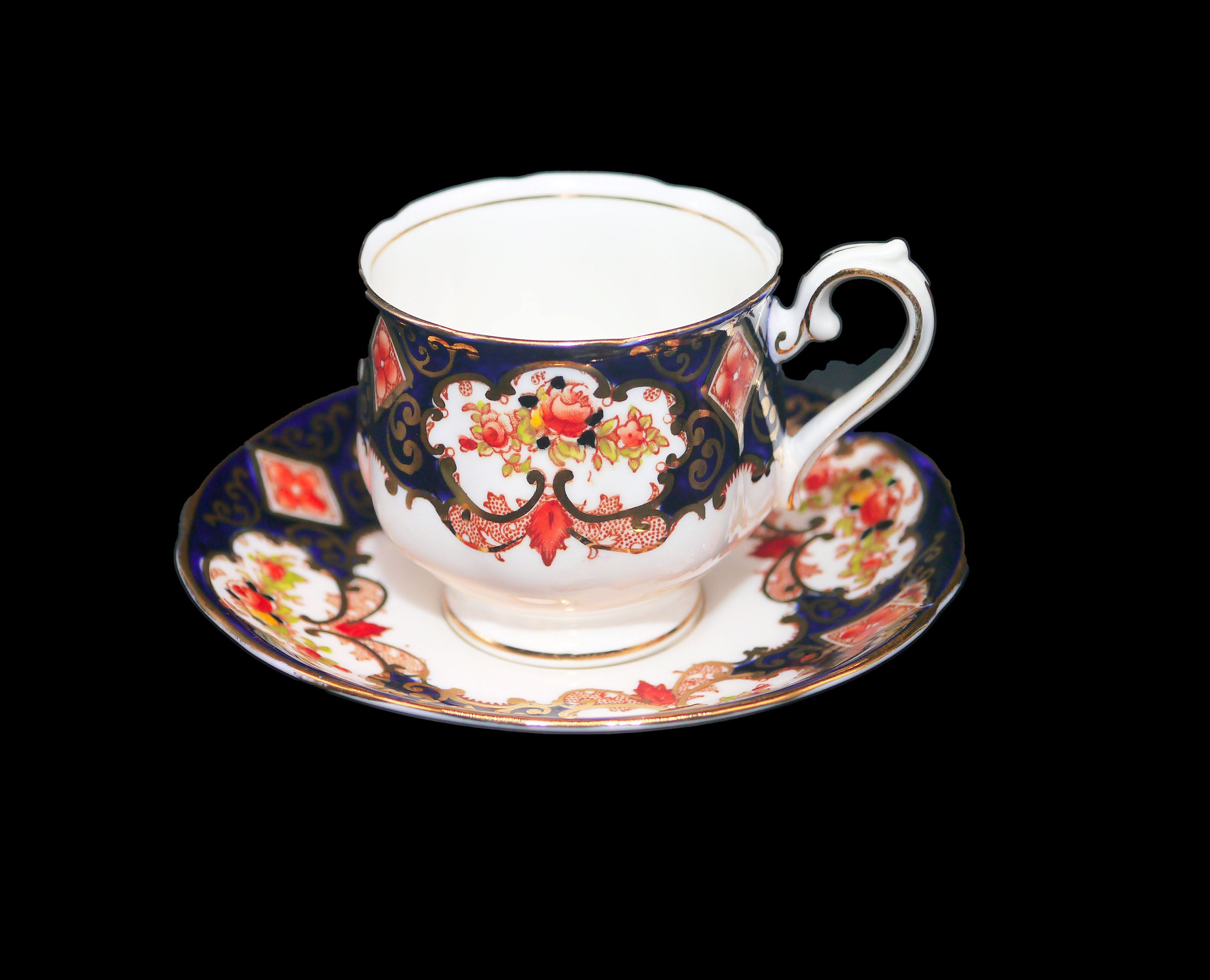 Antique Royal Albert Crown China 4594 handdecorated cup and saucer set