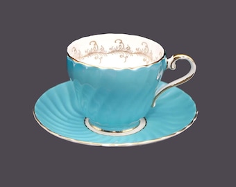 Vintage John Aynsley 1617 bone china tea set made England. Portland blue, gold laurels.