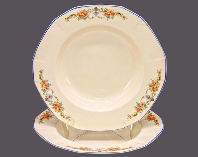 Pair of Alfred Meakin multisided rimmed soup bowls. Orange, blue floral swags and scrolls, blue trim. Flaws (see below).