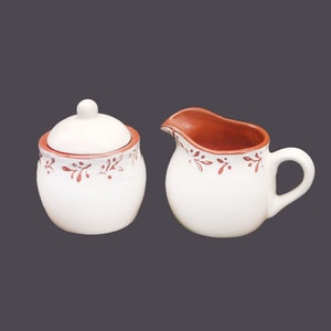 Vintage Skye McGhie Country Flair creamer and covered sugar bowl set.