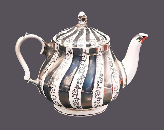Sadler 2822 silver lusterware four-cup teapot made in England.