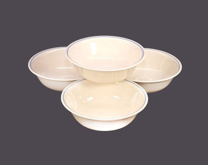 Four Corelle Corningware Blue Lily coupe cereal bowls made in the USA.