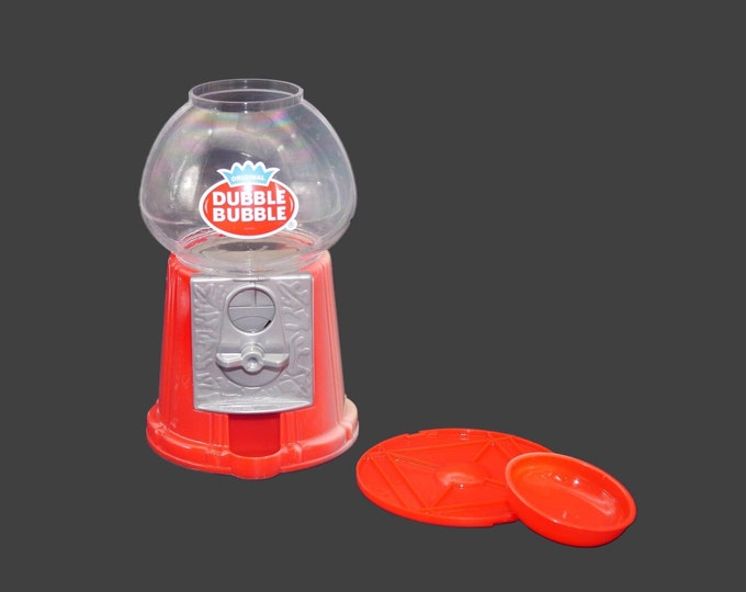 Dubble Bubble plastic gumball | gum dispensing machine. Takes US and Canadian coins.