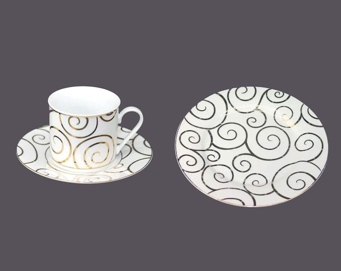 Pier 1 Gold Swirl Christmas trio of cup and saucer set and one salad plate.