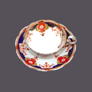 Antique Royal Albert Crown China 5294 hand-decorated cup and saucer set. Bone china made in England.