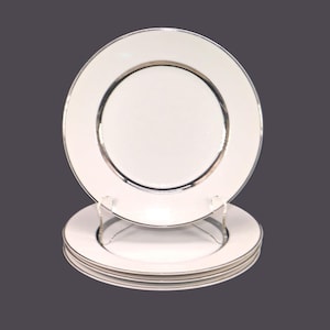 Four Harmony House Silver Rhapsody salad plates made in Japan.