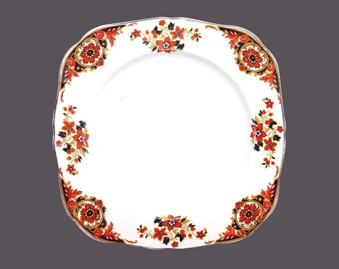 Hollinshead & Kirkham | HK Tunstall square luncheon plate made in England. Rust florals, scrolls, black accents.
