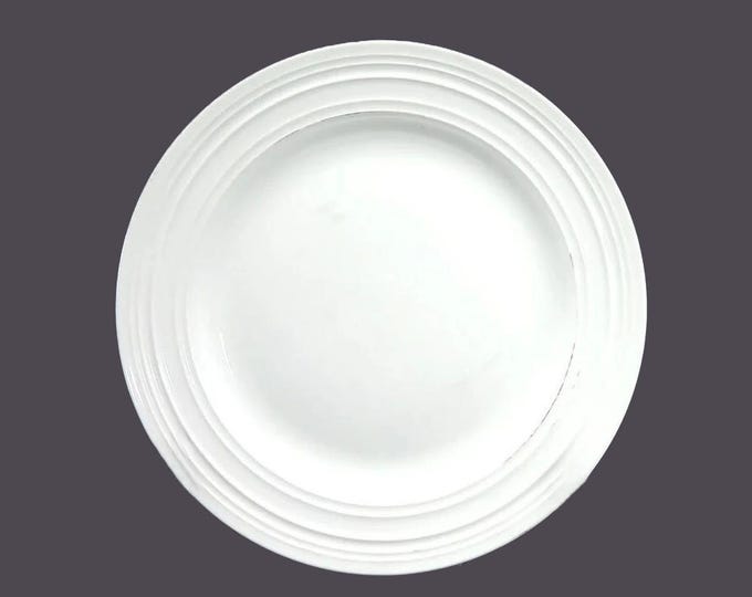 Mikasa Swirl White salad plate. Chef's favorite all-white tableware with embossed rings. Sold individually.