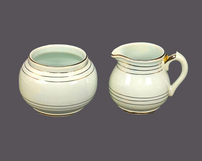 Sudlow's 01521 mint green and gold creamer and open sugar bowl set made in England.