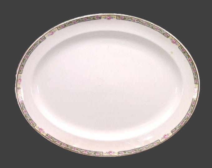 Antique art-nouveau Globe Pottery oval meat platter. Pink roses, black band, gold edge. Made in England. Similar to GLO8.