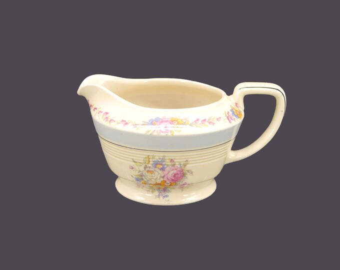 Wood & Sons creamer jug. Wood's Ivory Ware made in England. Central bouquet with roses, light blue band.