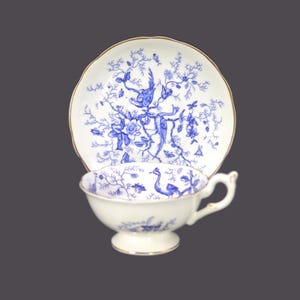 Coalport Cairo Blue blue-and-wide wide-mouth tea set. Bone china made in England. Blue birds on white. Gold dots on handle.