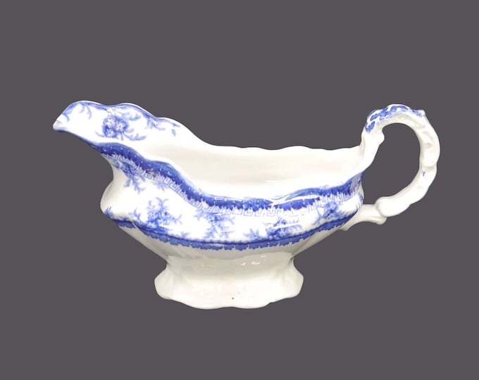 Antique later Victorian-era John Maddock Hamilton Blue flow-blue gravy or sauce boat made in England. Flaw (see below).