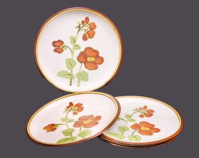 Four Noritake Melanie 8570 large stoneware dinner plates made in Japan.