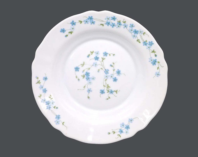 Arcopal blue-and-white milk glass tableware made in France. Romantique and Veronica.