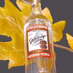 Vintage Stolichnaya Russian Vodka stemmed 4cl single shooter shot glass.