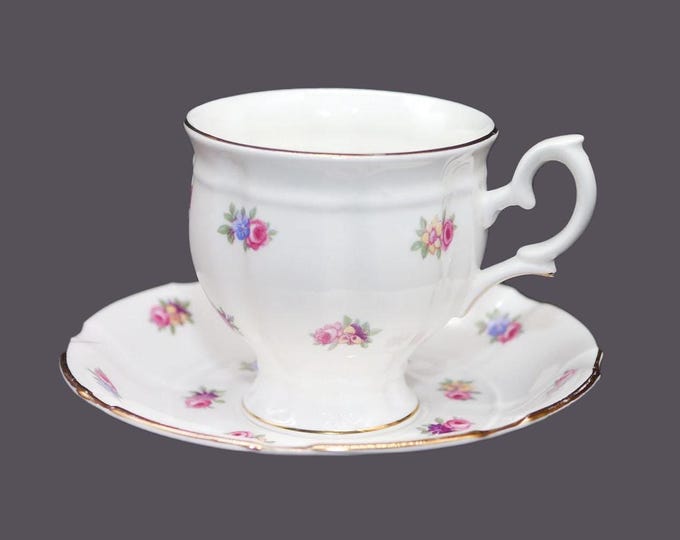 Vintage Crown Staffordshire A806 Bone China Cup and Saucer: pink floral sprays. England.