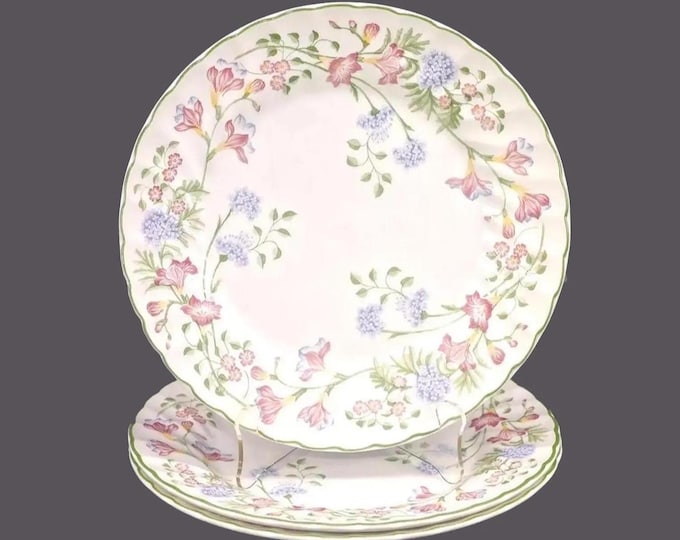 Three Churchill China Emily dinner plates made in England. Multicolor florals.