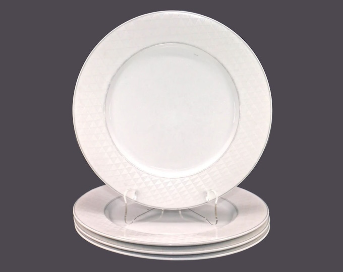 Four Studio Nova Pyramid White large dinner plates made in Japan. Flaws (see below).