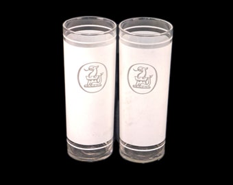 Pair of Dominion Glass frosted dragon | griffin on turret high-ball | tumbler glasses. Etched-glass artwork.