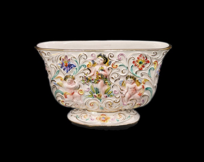Capodimonte centerpiece | oblong vase. High-relief nymphs, cherubs, flowers. Made in Italy for Birks. Flaw (see below).