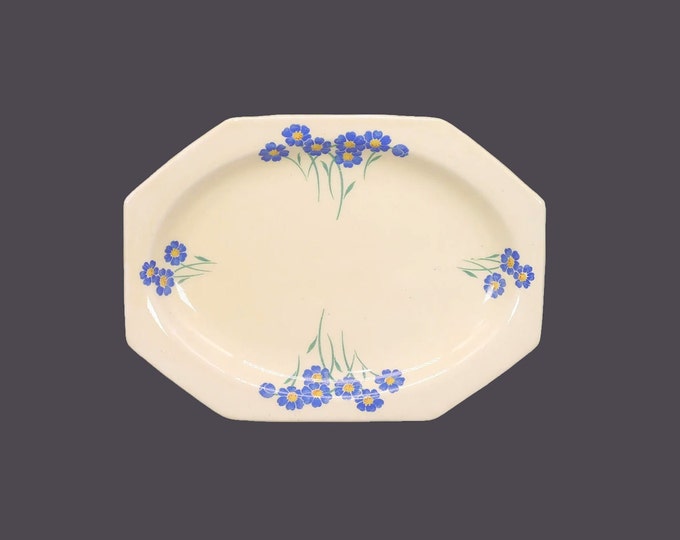 Art-deco era Royal Staffordshire 4292 snack plate made in England. Blue florals, yellow centers. Flaw (see below).