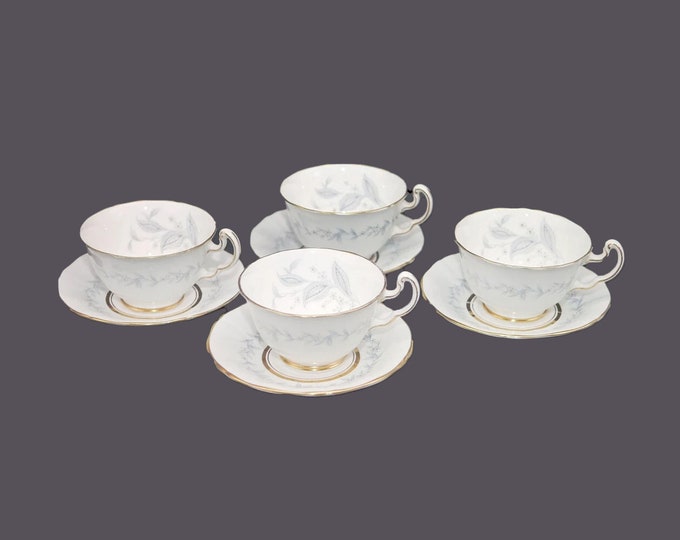 Four Northumbria AG Morning Mist hand-painted cup and saucer sets. Bone china made in England.