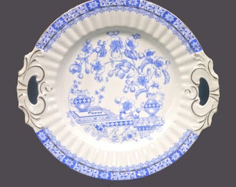 Antique Oscar Schaller Co. Blau China Deutschland blue-and-white handled serving plate.