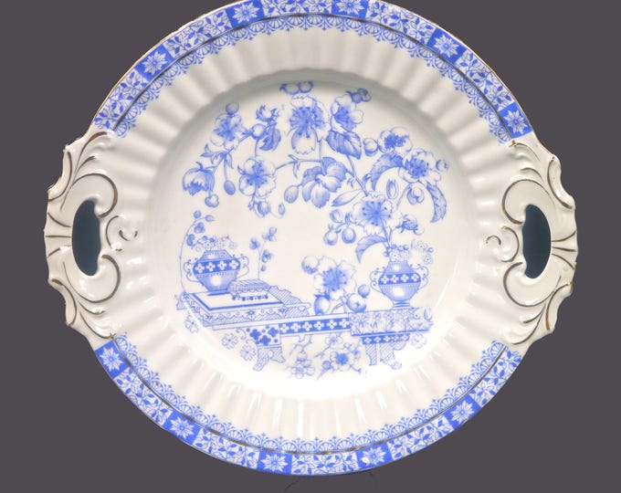 Antique Oscar Schaller Co. Blau China Deutschland blue-and-white handled serving plate.