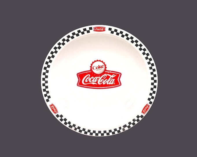 Gibson Designs Coca-Cola Town Square rimmed salad plate. Red Coke banner, cap, checked border.