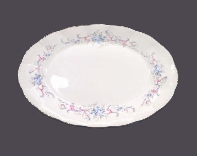 Paragon Romance gravy boat under-plate only. Bone china made in England.