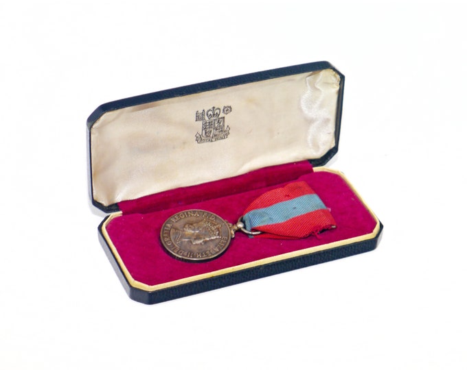 Queen Elizabeth II Imperial Service Medal for Faithful Service 1953. Original case, ribbon and clasp.