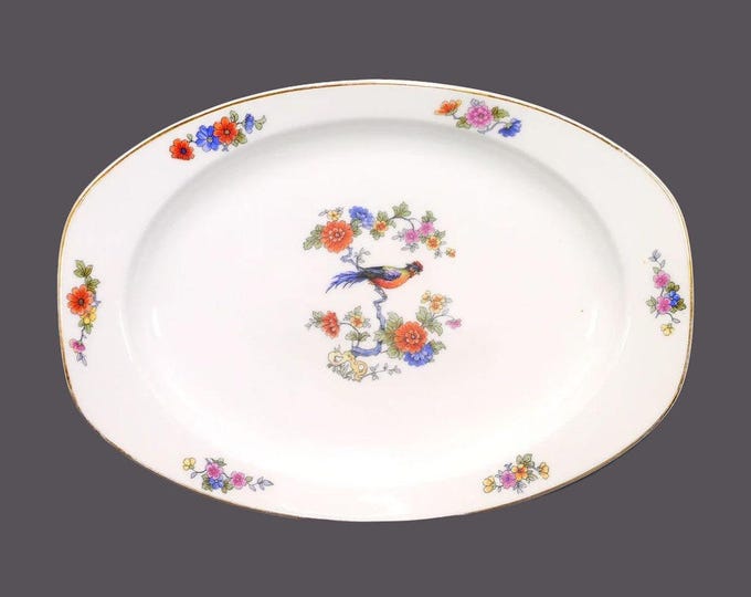 Thun Karlovarsky THU167 oval platter made in Czechoslovakia. Bird of Paradise, florals.