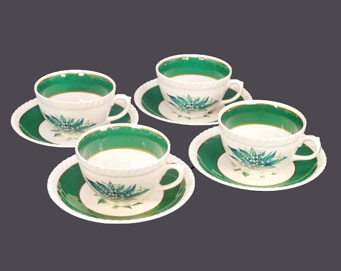 Four Sovereign Potters Sovereign Princess cup and saucer sets. English ironstone decorated in Canada.