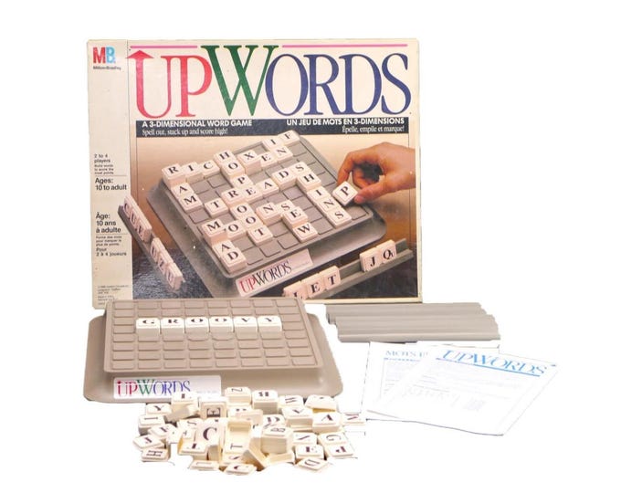 Upwords 3D scrabble board game published by Milton Bradley 1989. Complete.