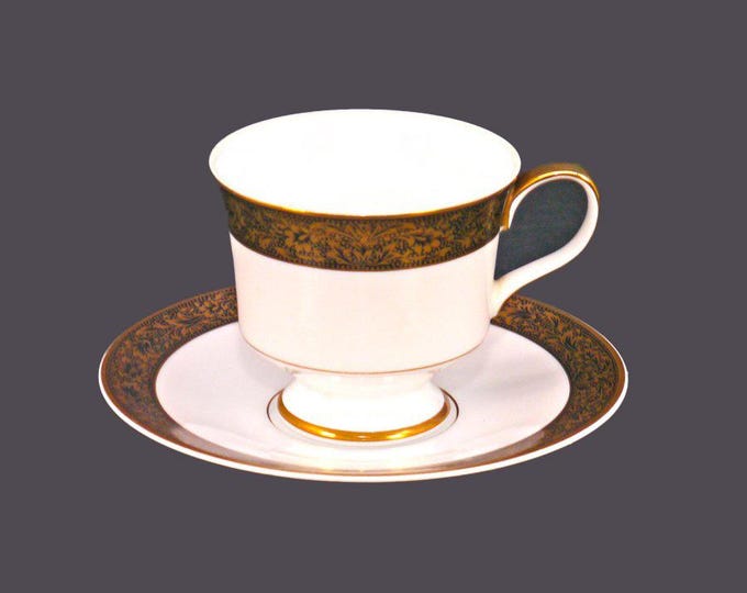 Sango Hampton 3758 cup and saucer set made in Japan. Black with encrusted gold. Sold individually.