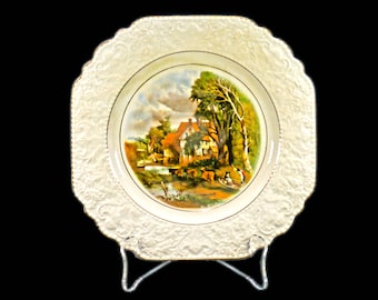 Lord Nelson Pottery | Lord Nelson Ware creamware display plate. Central image Valley Farm John Constable. Made in England.