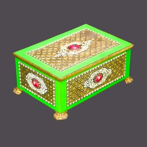 Art-deco era Blue Bird Toffee tin. High-relief details, gold lattice, green accents, sits on four sculpted feet. Made in England.