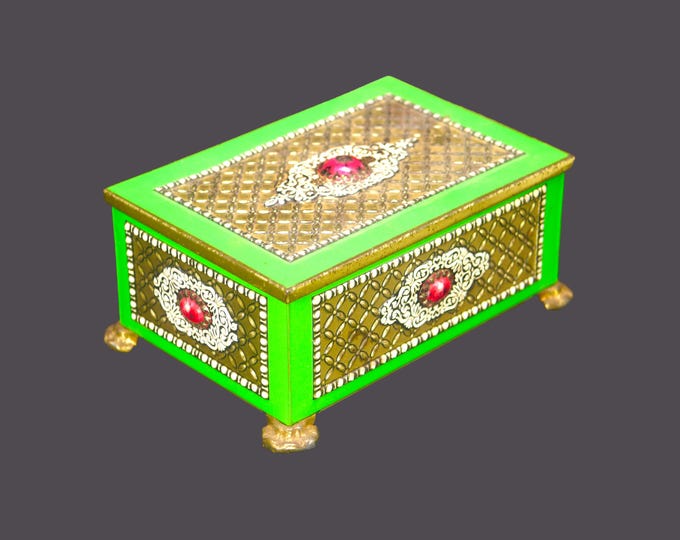 Art-deco era Blue Bird Toffee tin. High-relief details, gold lattice, green accents, sits on four sculpted feet. Made in England.