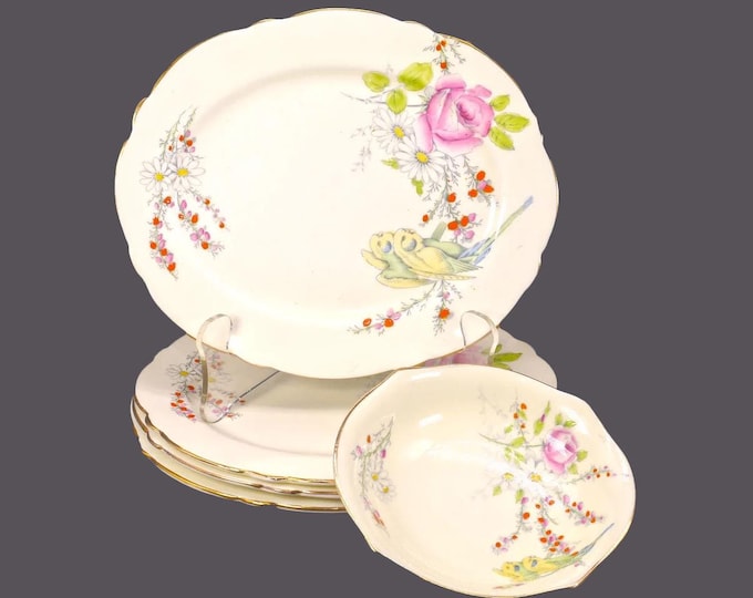 Four Paragon Princess Margaret Rose oval dessert plates with candy dish. Bone china made in England.