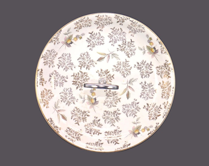 Barratt's gold chintz cake serving plate with metal center handle. Delphatic White ironstone made in England.