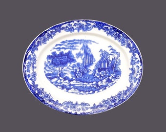 Antique flow-blue Chinoiserie platter. Attributed 19th Century England. Flaws.