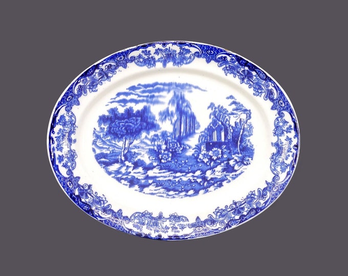 Antique flow-blue Chinoiserie platter. Attributed 19th Century England. Flaws.