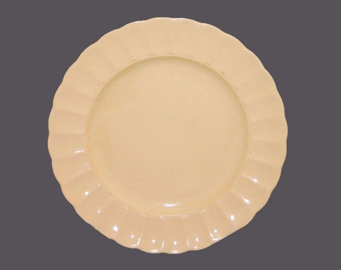 Sovereign Potters Morn Glo all-yellow small dinner or luncheon plate. English ironstone decorated in Canada.