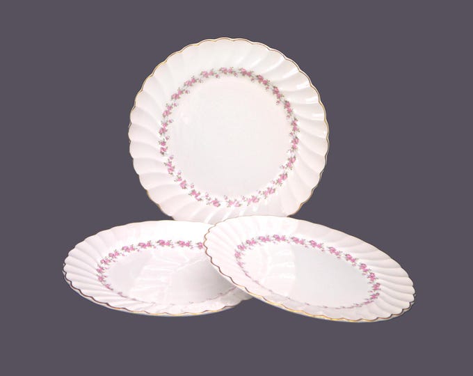 Three Myott Pink Petite dinner plates made in England. Crazing (see below).