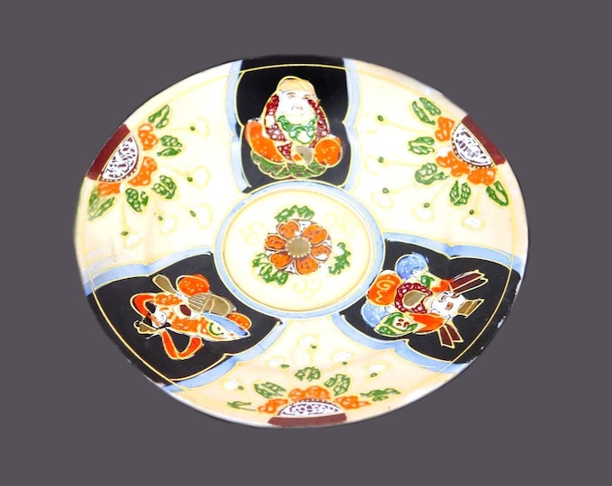 Hand-painted Katuni moriage plate. Winged Buddah, consorts, orange and white florals. Made in Japan.