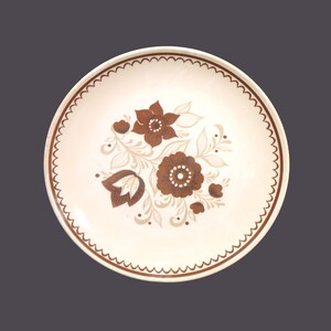 Jeannette | Royal China Nutmeg dinner plate made in the USA. Sold individually. Flaw (see below).